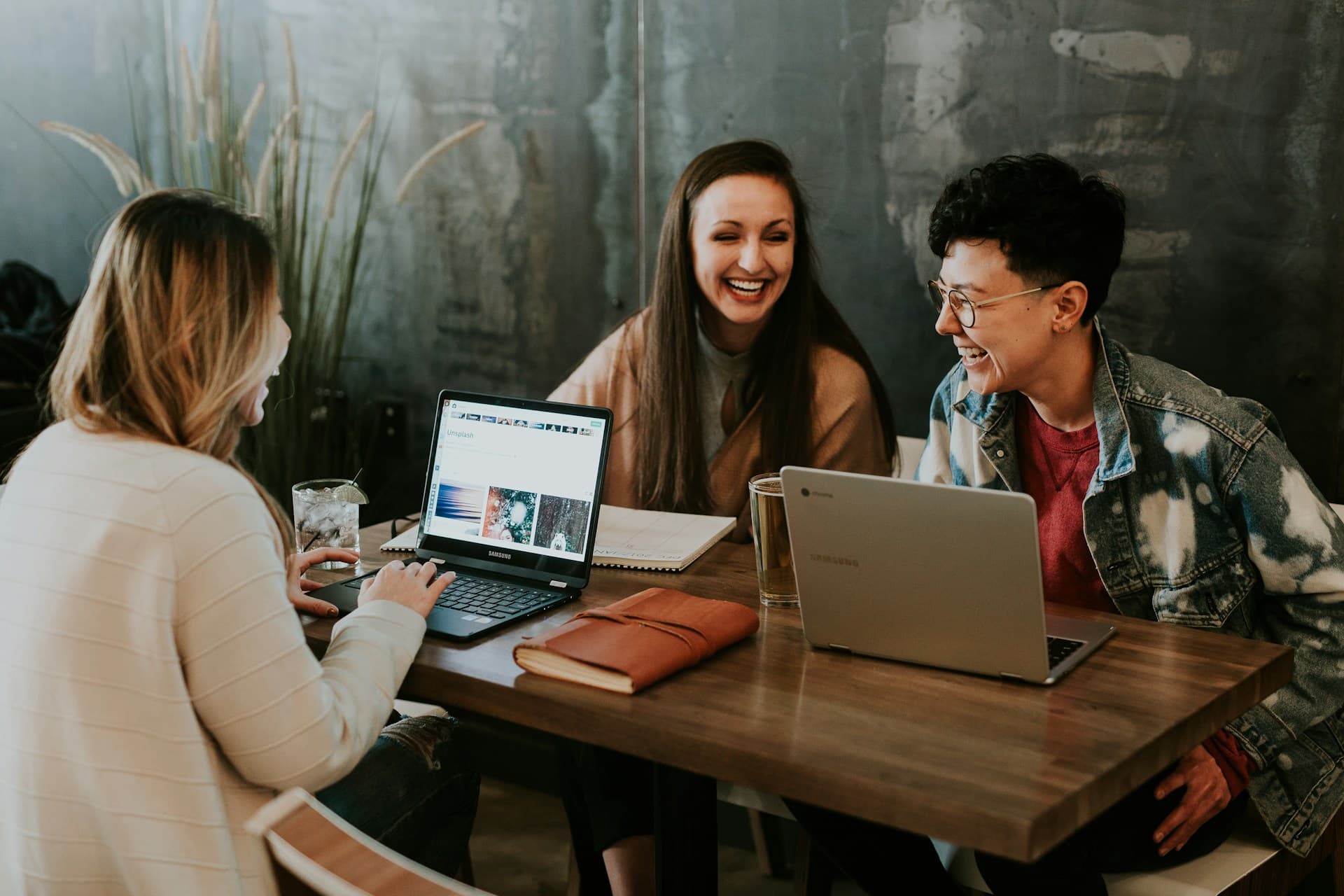 Marketing team collaborating on digital solutions around a table